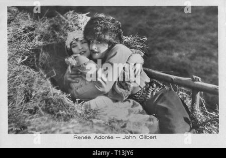 La photographie publicitaire de Renée adorée et John Gilbert dans les Cosaques (1928) - L'ère du cinéma muet Banque D'Images