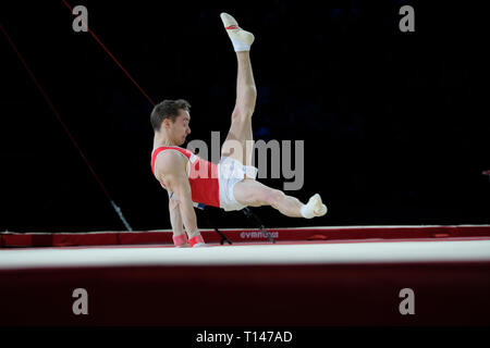 Birmingham, Royaume-Uni. Mar 23, 2019. Christian Baumann (SUI) à l'exécution de la compétition masculine de la Coupe du Monde de Gymnastique à Birmingham, Royaume-Uni. Credit : Giovanni Strondl/Alamy Live News Banque D'Images