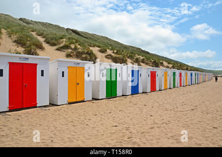 Cabines de plage sur la plage de Woolacombe, Woolacombe Bay, Devon, UK Banque D'Images