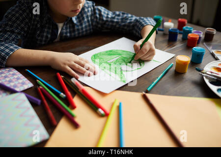 Boy Drawing Monster Banque D'Images