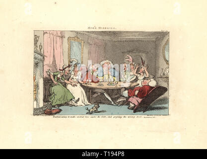 Gentleman essayant de jouer footsie avec une beauté sous la table à manger, mais si vous appuyez sur le mauvais pied. Plus de misères. Coloriée à la gravure sur cuivre conçu et gravé par Thomas ROWLANDSON pour accompagner le révérend James Beresford's misères de la vie humaine, Ackermann, 1808. Banque D'Images