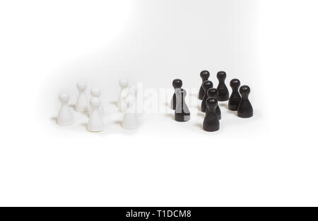 Les pions regroupés par rapport à l'autre Banque D'Images