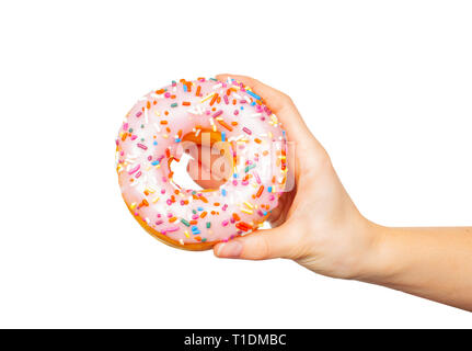 Eating main de femme. Anneau de couleur pastel sur fond blanc Banque D'Images
