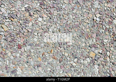 Joli mur fait avec des pierres colorées. La texture de la paroi extérieure d'un bâtiment. Cette photo montre la belle architecture. Banque D'Images