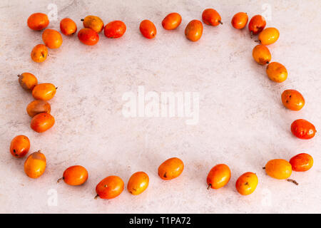 Fruit Siriguela avec fond blanc Banque D'Images