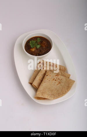 chappati avec curry de poulet Banque D'Images