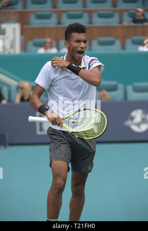 Miami Gardens, Florida, USA. 29 Mar 2019. John Isner bat USA de Felix Auger-Aliassime du Canada dans la demi-finale au cours de jour 12 de l'Open de tennis de Miami le 29 mars 2019 à Miami Gardens, en Floride. Personnes : Félix Auger-Aliassime Credit : tempêtes Media Group/Alamy Live News Banque D'Images