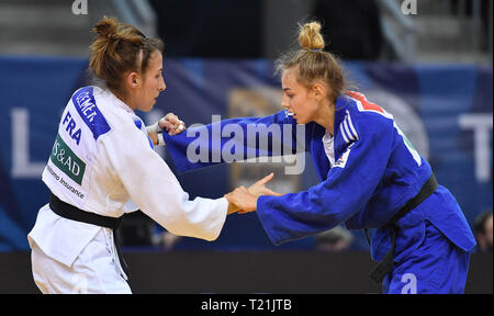 Tbilissi, Géorgie. Mar 29, 2019. Daria Bilodid (R) de l'Ukraine le dispute à Melanie Clement de la France lors de la compétition finale de 48 kg de la Tbilissi 2019 Grand Prix de judo à Tbilissi, Géorgie, le 29 mars 2019. Melanie Clement a remporté la médaille d'or. Credit : Kulumbegashvili Tamuna/Xinhua/Alamy Live News Banque D'Images