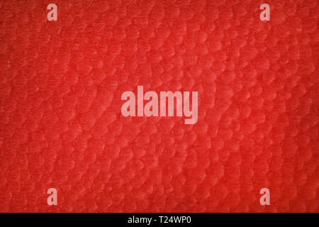 Résumé fond rouge texturé. Bulles sur papier de couleur brique Banque D'Images