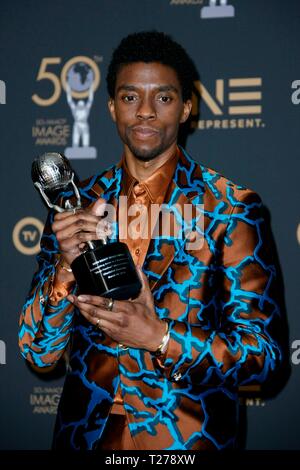 Californie, USA. 30 mars 2019. Chadwick Boseman à la 50ème NAACP Image Awards Press Room Le Dolby Theatre le 30 mars 2019 à Hollywood, CA. Credit : Crédit : CraSH/imageSPACE Imagespace/Alamy Live News Banque D'Images