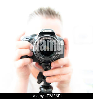 Photographe avec Canon DSLR Banque D'Images