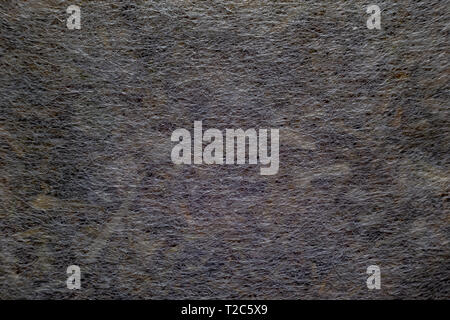 Un plan macro extrême d'un sachet de thé montrant la structure du matériau. Banque D'Images