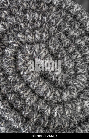 Macro Close-up shot interrogées jusqu'tissé polyester Tissu. Métaphore dans le temps, cousu, cousu chaine et trame, industrie textile, "sur un rouleau', bord tissé Banque D'Images