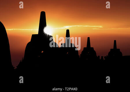 Silhouette Borobudur Temple à l'aube de temps avec light burst, Yogyakarta, Java, Indonésie. Banque D'Images