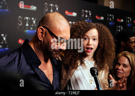 Chloe acteurs Coleman et Dave Bautista arrive sur le tapis rouge pour la présentation STXfilms CinemaCon's "l'état de l'industrie : Passé, présent et futur" au Colosseum du Caesars Palace, le 2 avril 2019 à Las Vegas, Nevada. Banque D'Images