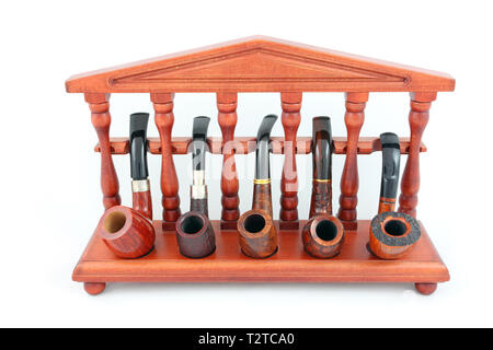 Collection de pipes sur support en bois Banque D'Images