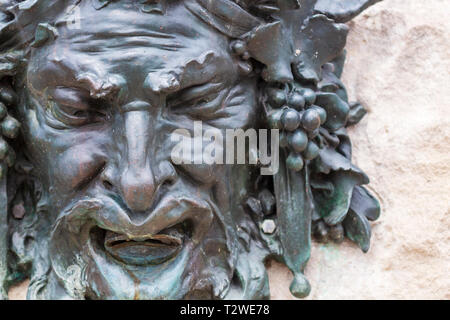 Un gros plan de cette ornementation sculpturale Bacchus révèle l'agonie, au Biltmore Estate à Asheville, NC, USA Banque D'Images