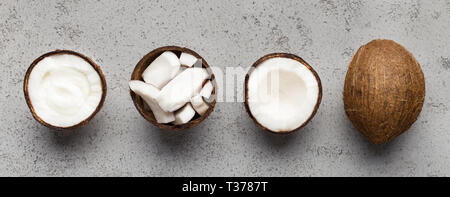 Tout frais et haché de coco sur fond de béton vue supérieure Banque D'Images