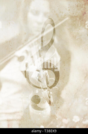 Le violoniste et le violon clef. Music concept. L'ancienne structure. Banque D'Images