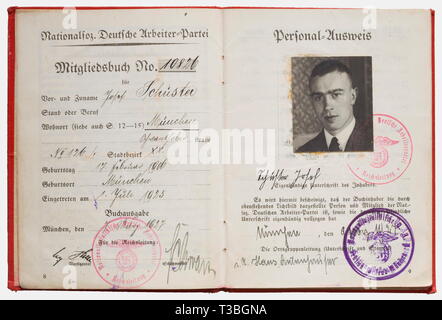 Josef Schuster, documents, sa dague et décorations de l'ordre du sang NSDAP au porteur n° 10826 Livre d'adhésion avec signature originale à l'encre d'Adolf Hitler et Franz Xaver Schwarz, la photo d'identité en civil détaché et re-collé, dont les cotisations entrées pour Gilmore à Vancouver et une entrée (trad.) à partir du 1er juillet '30 avec SS Munich - maintenant Sturm 1/I/1 - N° 3261 SS SS SS-Standarte' avec le cachet et la signature d'un Sturmbannführer. (Voir aussi lâche contraignant l'appel livre de SS Sturm 1 dans ce catalogue, lot no.  ? ? ?, Dans laquelle Schuster est répertorié comme entrant 22 juillet 30), une transmission, le Editorial-Use-seulement Banque D'Images