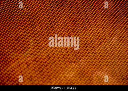 Shedow floue à partir de la tôle perforée tôle rouillée sur le net. Surface avec la profondeur de champ. Arrière-plan horizontal Banque D'Images