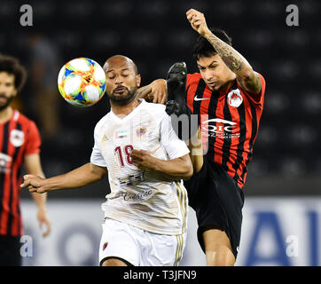 Doha, Qatar. Apr 9, 2019. Ahmed Ali (L) d'Al Wahda CCSF rivalise avec Lucca d'Al Rayyan SC au cours de l'Asie de l'AFC Champions League match du groupe B entre le Qatar's Al Rayyan SC et Al Wahda des EAU au CCSF Jassim Bin Hamad Stadium de Doha, capitale du Qatar, le 9 avril 2019. Al Wahda a gagné 2-1. Credit : Nikku/Xinhua/Alamy Live News Banque D'Images