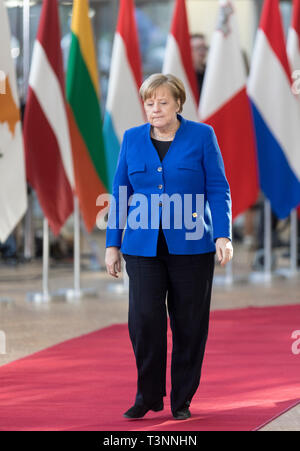 10 avril 2019, Belgique, Bruxelles : la Chancelière Angela Merkel (CDU) s'agit de l'UE sommet spécial sur Brexit. Peu de temps avant le début de l'UE sommet spécial sur Brexit, un nouveau report du retrait britannique de l'UE est devenue apparente. Photo : Thierry Monasse/dpa Banque D'Images