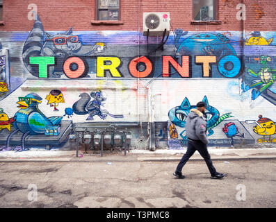 Art urbain brillant et peintures murales Graffiti sur Alley (Rush Lane), dans le quartier de Queen Street West Toronto, Ontario, Canada. Banque D'Images
