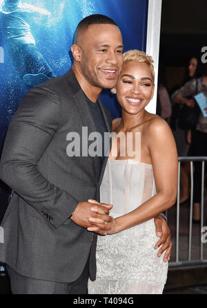 WESTWOOD, CA - le 11 avril : Devon Franklin (L) et Meagan Good assister à la première mondiale de la 20th Century Fox's 'Breakthrough' à Westwood Regency Theatre le 11 avril 2019 à Los Angeles, Californie. Banque D'Images