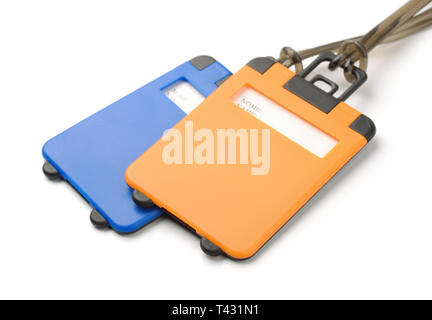 Deux étiquettes de bagages en plastique isolated on white Banque D'Images