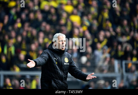 Dortmund, Allemagne. 13 avr, 2019. Soccer : Bundesliga Borussia Dortmund - FSV Mainz 05, 29e journée au parc Signal-Iduna. Coach Lucien Favre de Dortmund de gestes. Credit : Ina Fassbender/DPA - NOTE IMPORTANTE : en conformité avec les exigences de la DFL Deutsche Fußball Liga ou la DFB Deutscher Fußball-Bund, il est interdit d'utiliser ou avoir utilisé des photographies prises dans le stade et/ou la correspondance dans la séquence sous forme d'images et/ou vidéo-comme des séquences de photos./dpa/Alamy Live News Banque D'Images