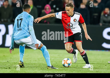 ROTTERDAM, Pays-Bas , 13-04-2019 , Stade de football De Kuip , néerlandais , Saison 2018/2019 Eredivisie , , Feyenoord - Heracles Almelo , Heracles Almelo dvd Brandley Kuwas (l) Feyenoord player Jens Toornstra pendant le match Banque D'Images