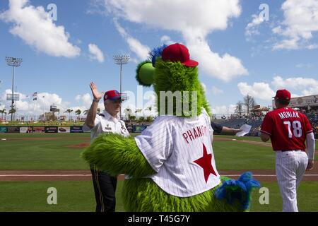 Joni Fregosi gets a hug from Philadelphia Phillies spring instructor Mickey  Morandini following a ceremony to honor her husband former Phillies manager  Jim Fregosi before an exhibition baseball game between the Phillies