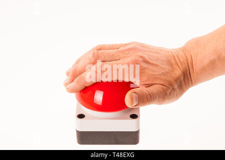 En poussant à la main un buzzer rouge Banque D'Images