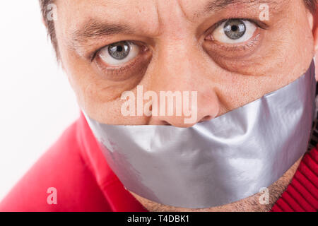 L'homme avec la bouche bâillonnée de bande Banque D'Images