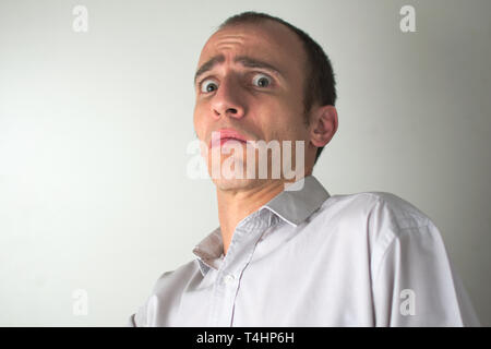 Portrait d'un homme d'affaires avec une expression de peur. Banque D'Images