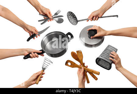 L'ensemble de l'équipement de cuisine en mains, sur fond blanc Banque D'Images