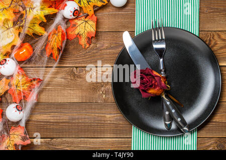 Halloween avec fond en bois, les yeux d'araignée Banque D'Images