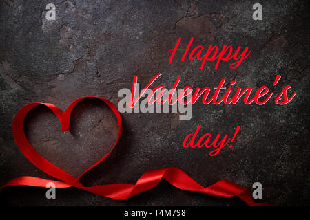 Happy Valentine Day card. Valentines Day background avec cœur rouge. Rubans de forme de coeur Banque D'Images