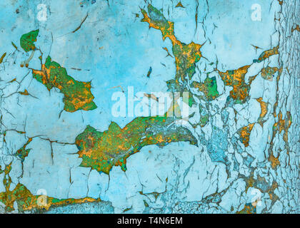 Vieux mur en bois coloré avec un unregular l'écaillage de la peinture bleu craquelé pattern, un abstract grunge texture background Banque D'Images