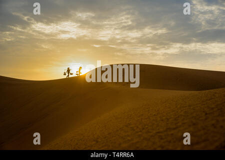 Vietnamienne fournisseurs sur la colline de sable rouge de Mui Ne, Binh Thuan Banque D'Images