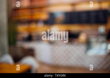 Defocused agréable café shop store pour l'arrière-plan flou - peut être utilisé pour le fond pour le marketing et de produit Banque D'Images