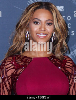 (20 Apr 2019). Beyonce's Netflix s'occuper d'une valeur de 60 millions de dollars. Photo prise : Inglewood, LOS ANGELES, CA, USA - 24 août : la chanteuse Beyonce porte une robe Zuhair Murad, chaussures Christian Louboutin, et Lorraine Schwartz pose de bijoux dans la salle de presse au 2014 MTV Video Music Awards qui a eu lieu lors du Forum le 24 août 2014 à Inglewood, Los Angeles, Californie, États-Unis. (Photo par Xavier Collin/Image Crédit : Agence de Presse) L'agence de presse Image/Alamy Live News Banque D'Images