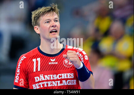 Mannheim, Allemagne. Apr 21, 2019. Handball : Bundesliga, Rhein-Neckar Löwen - SG Flensburg-Handewitt, 22e journée, dans l'Arène de SAP. Flensburg est lasse Svan cheers sur une porte. Credit : Uwe Anspach/dpa/Alamy Live News Banque D'Images