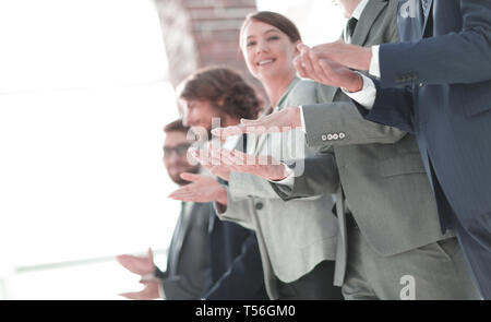 Les gens d'affaires mains applaudir Banque D'Images