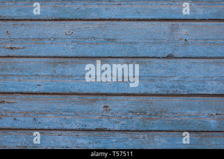 La texture de la paroi en bois. L'écaillage de la peinture. La texture de fond. Vieux Mur Banque D'Images