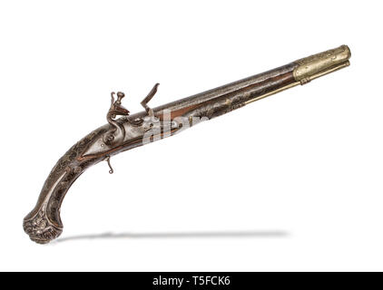 Le 19ème siècle, le Turc pistolet à silex avec de l'argent et incrustations en laiton sur stock en bois. Banque D'Images