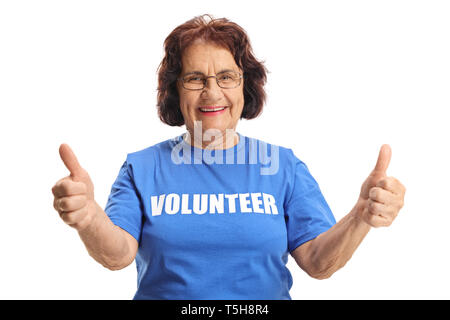 Bénévole des femmes âgées gaies showing Thumbs up isolé sur fond blanc Banque D'Images