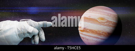 Soulignant l'astronaute planète Jupiter Banque D'Images