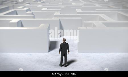 Miniature jouet figurine homme d'entrer dans une immense structure labyrinthe blanc Banque D'Images